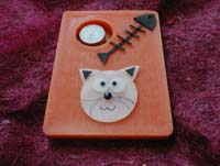 Base e gato em parafina